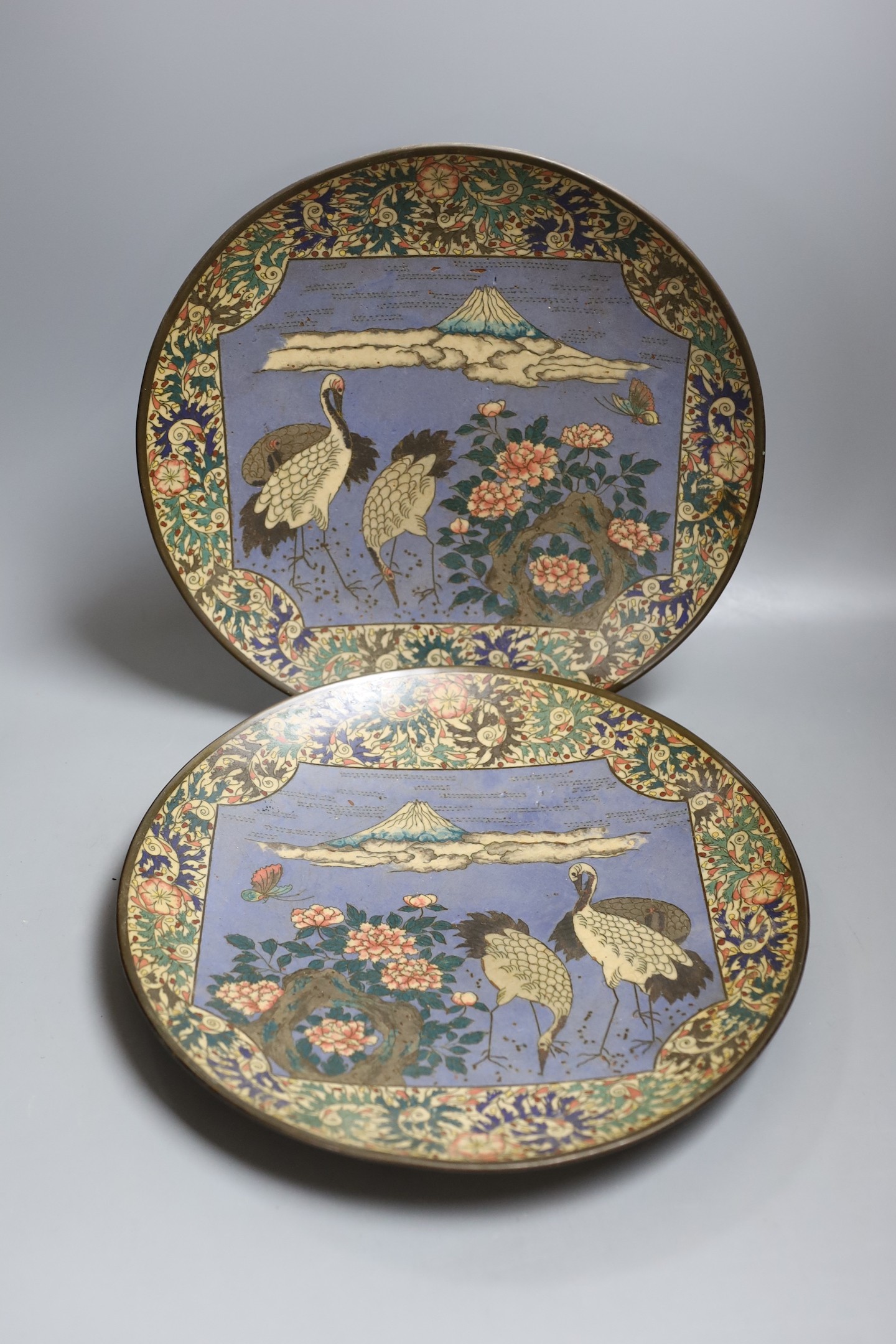 A pair of Japanese cloisonné enamel dishes, Meiji period - 29cm diameter